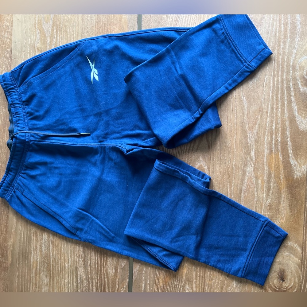 Three Reebok sweatpants size s